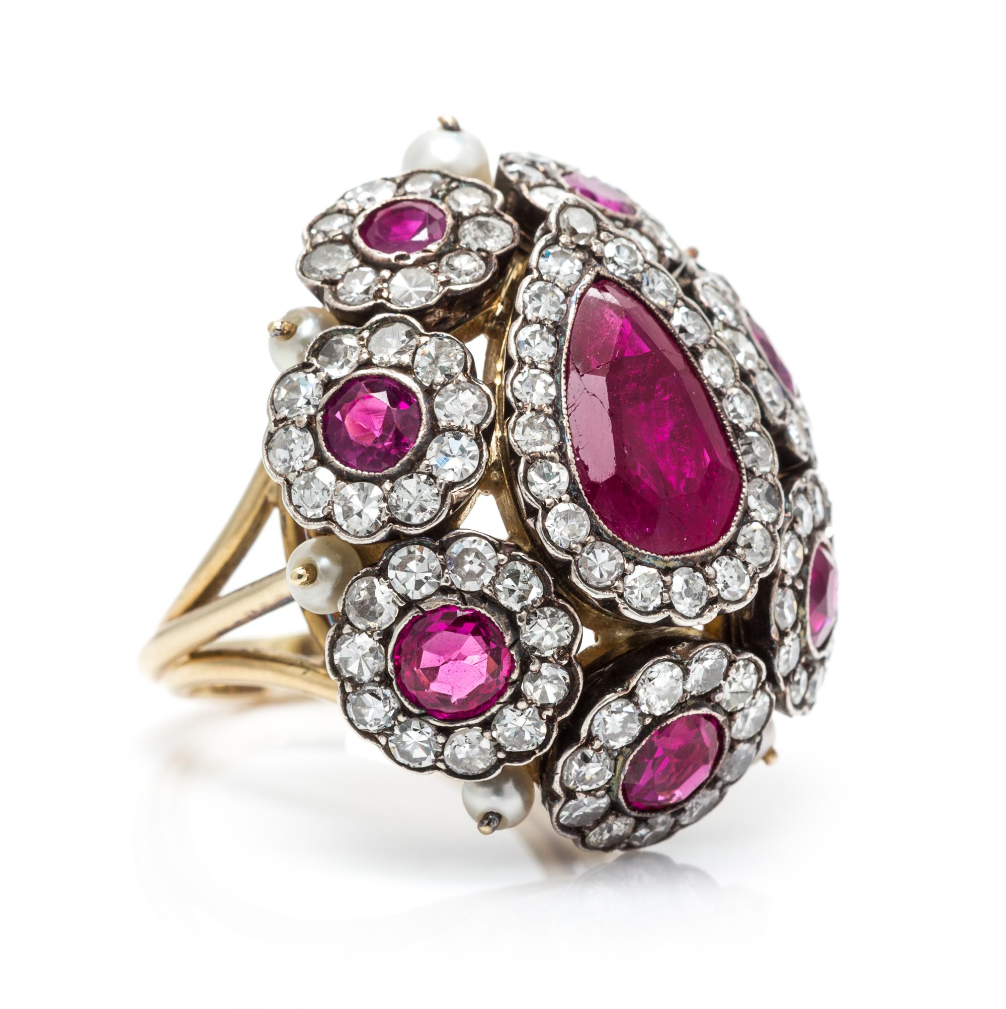 A Silver Topped Gold, Ruby, Pearl and Diamond Dome Ring, 12.60 dwts.
