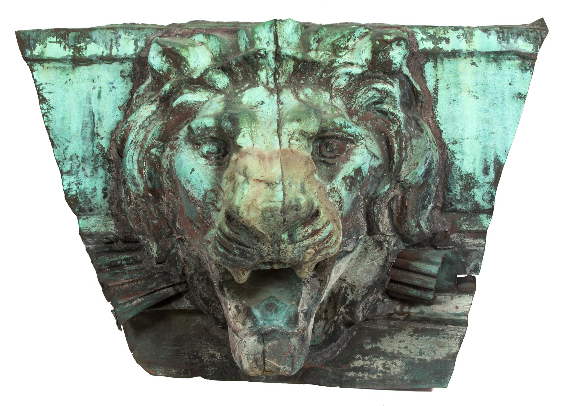 A Continental Patinated Cast Lead Lion Mask Wall Mount Height 24 x width 24 inches. — 19TH CENTURY