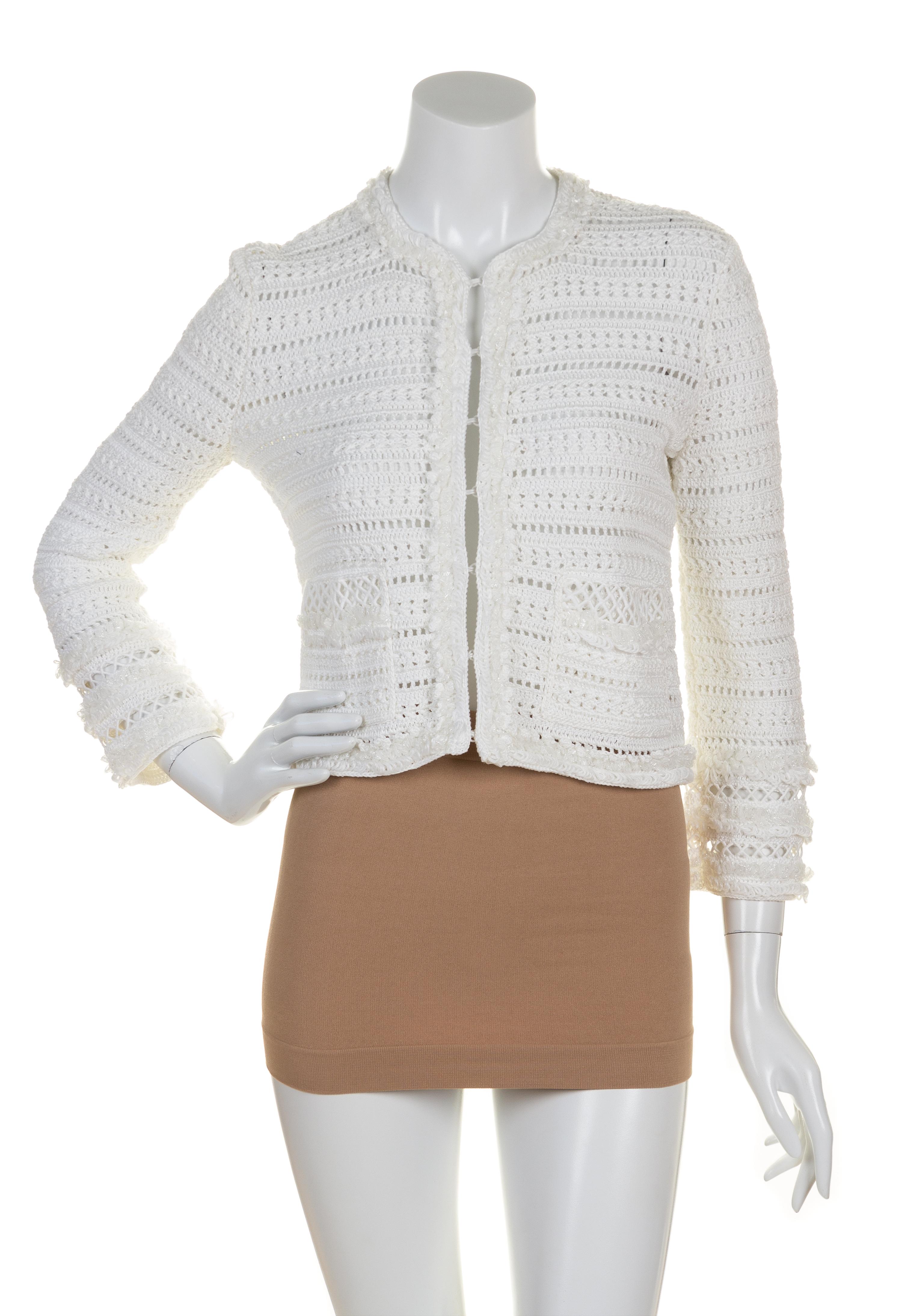 An Oscar de la Renta White Cotton Skirt Ensemble, Skirt size 10, cardigan S.