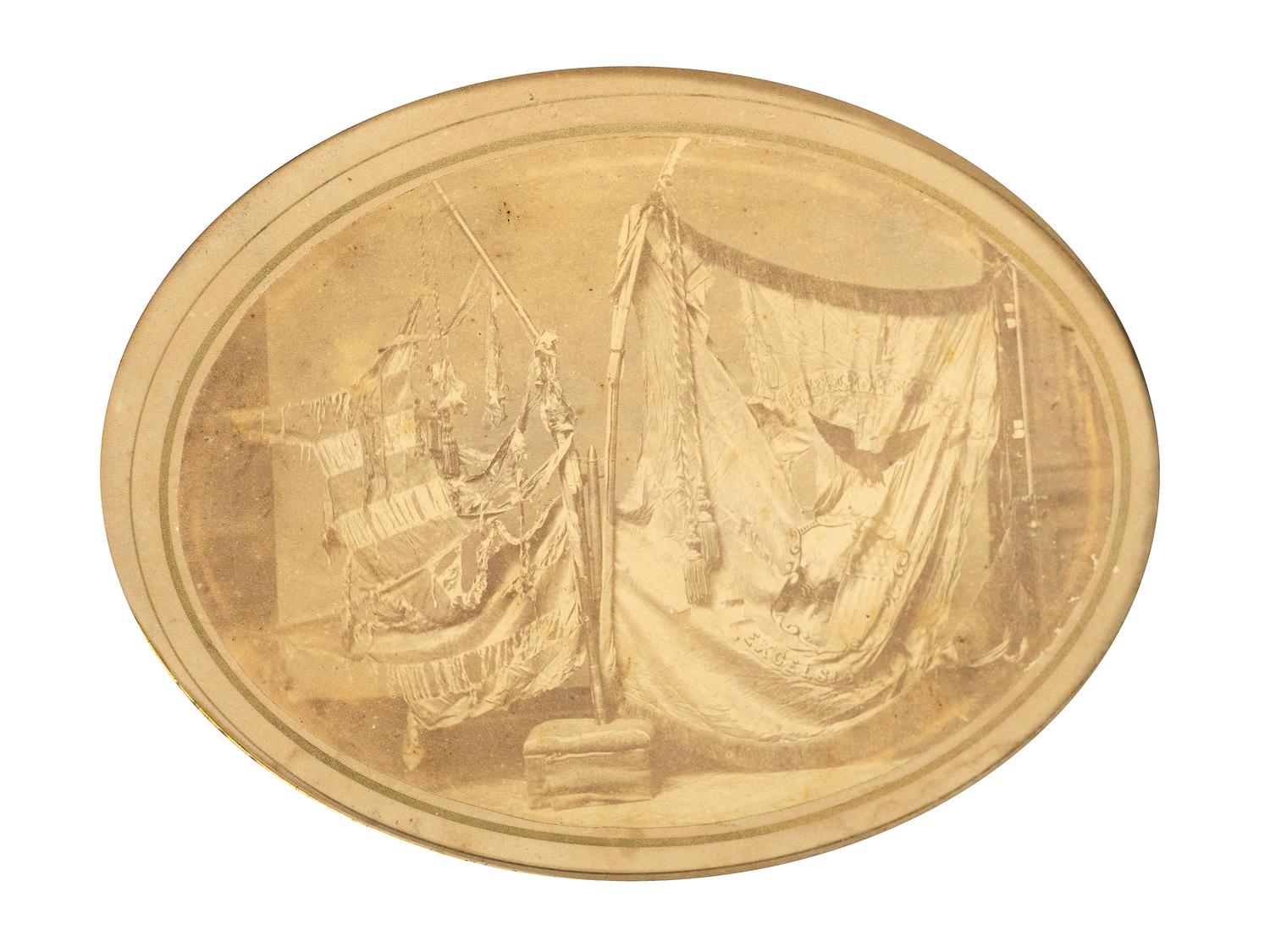 [CIVIL WAR]. Albumen photograph of the battle-damaged flags of the 75th New York Infantry.