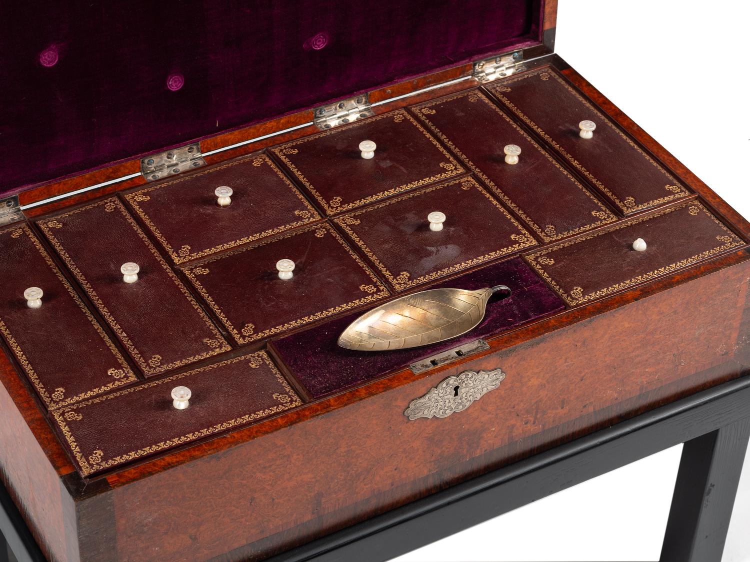 An English Rosewood and Burl Yew Wood Ten-Compartment Tea Caddy