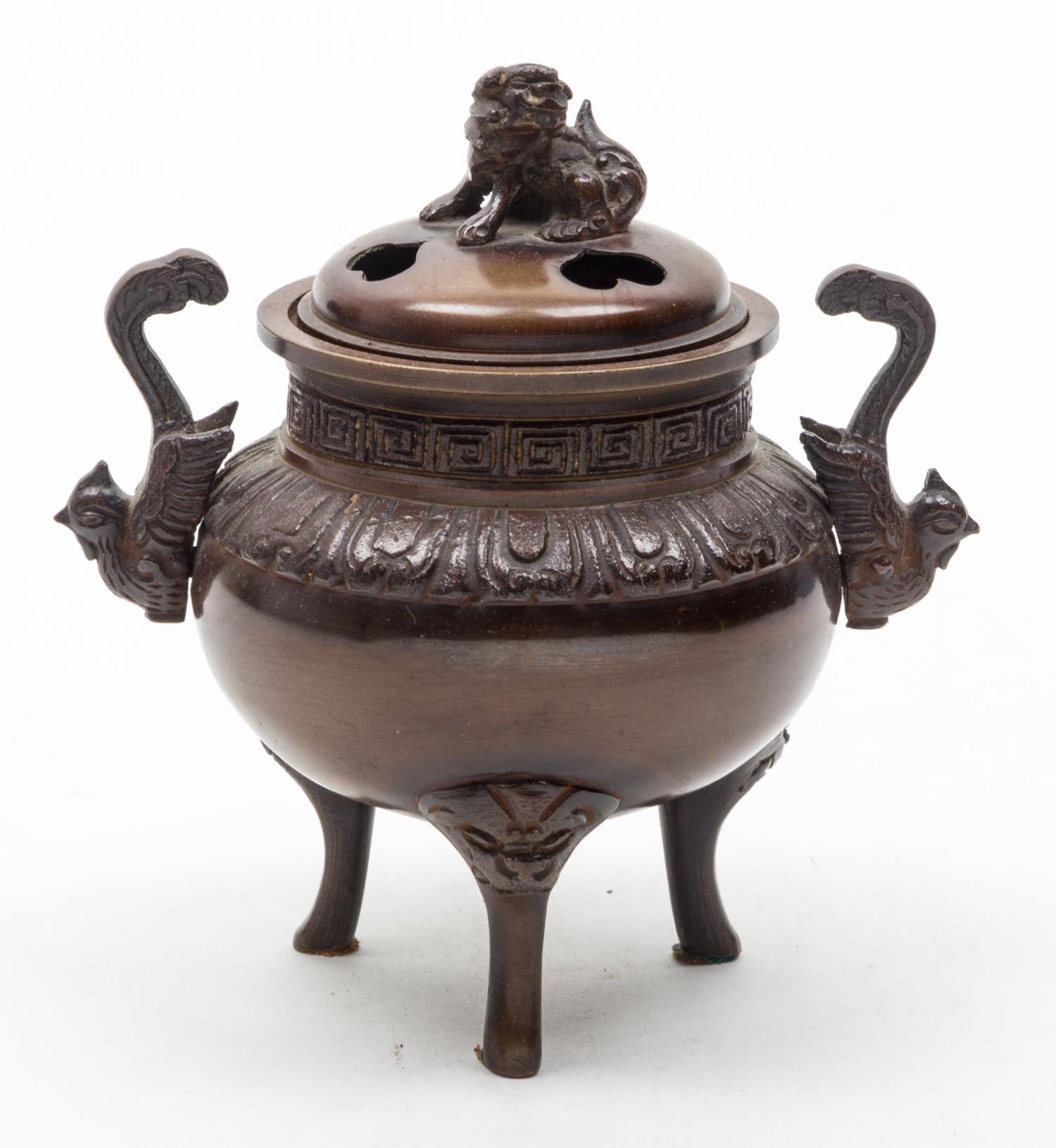A Small Bronze Tripod Censer Height 5 3/4 inches.