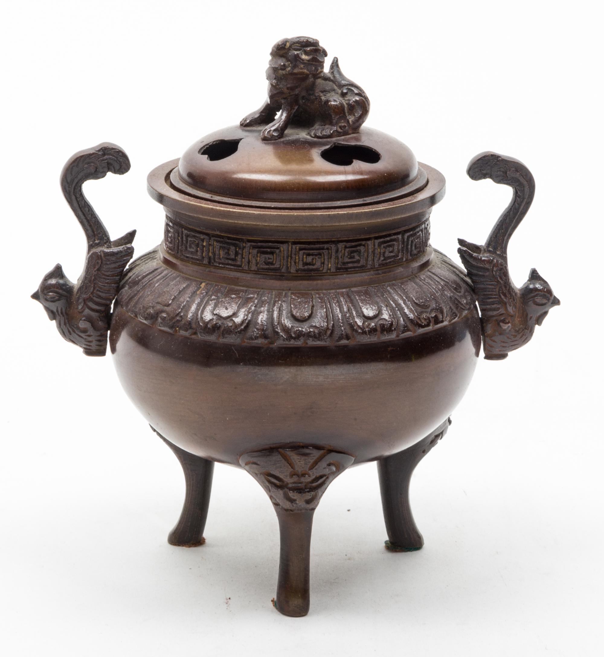 A Small Bronze Tripod Censer Height 5 3/4 inches.