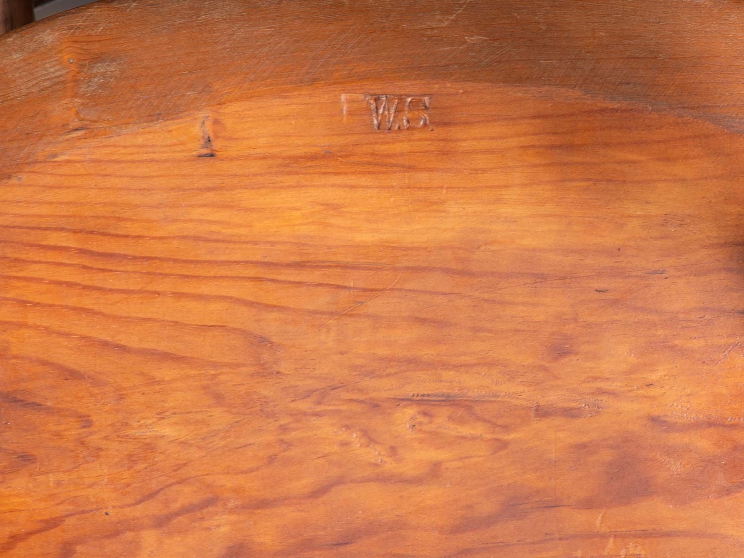 A Volute and Scroll Carved and Reel Turned Windsor Armchair