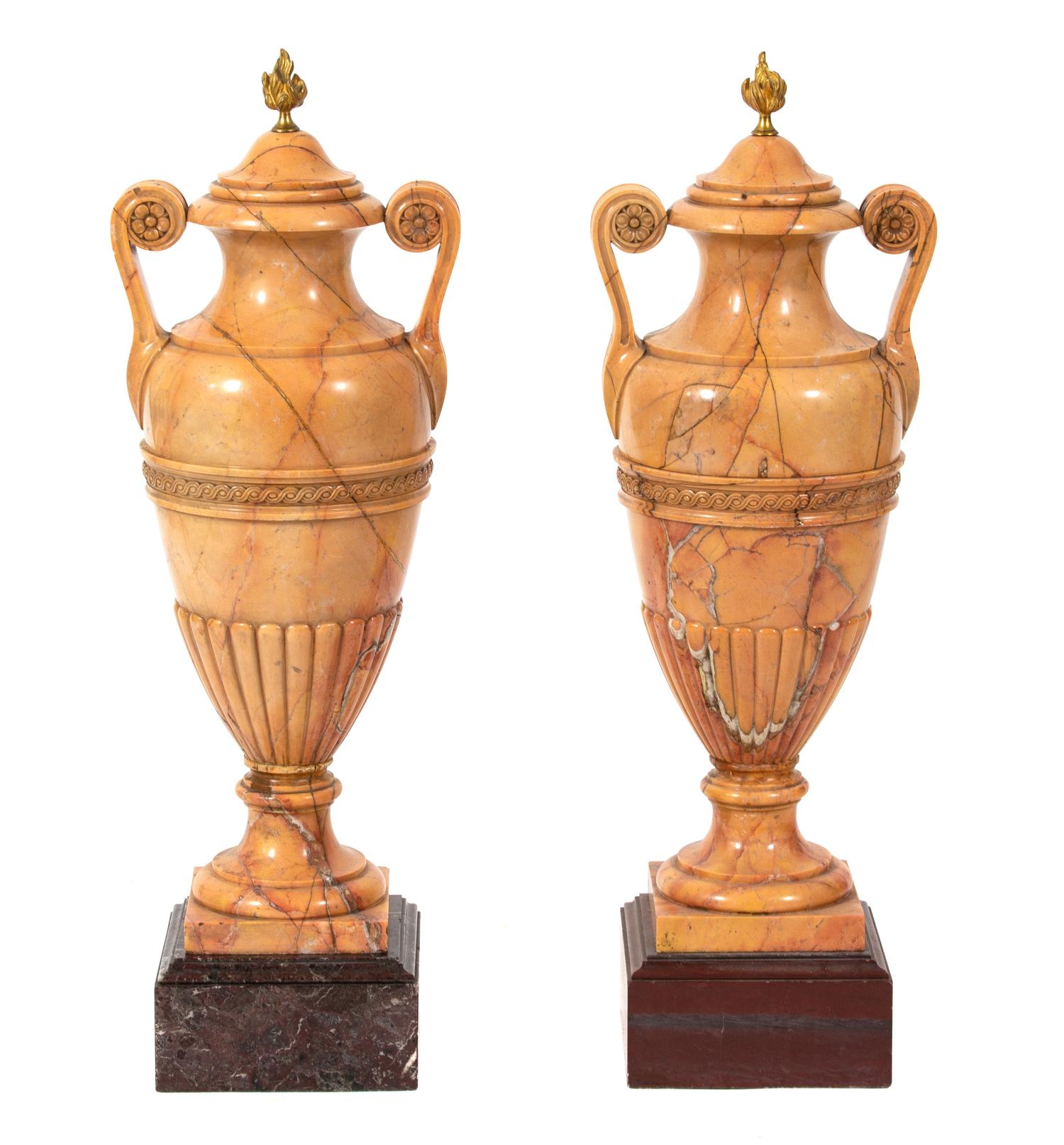 A Pair of Italian Crema Valencia Marble Double-Handled Urns Height 30 x diameter 10 1/2 inches. — 19TH CENTURY