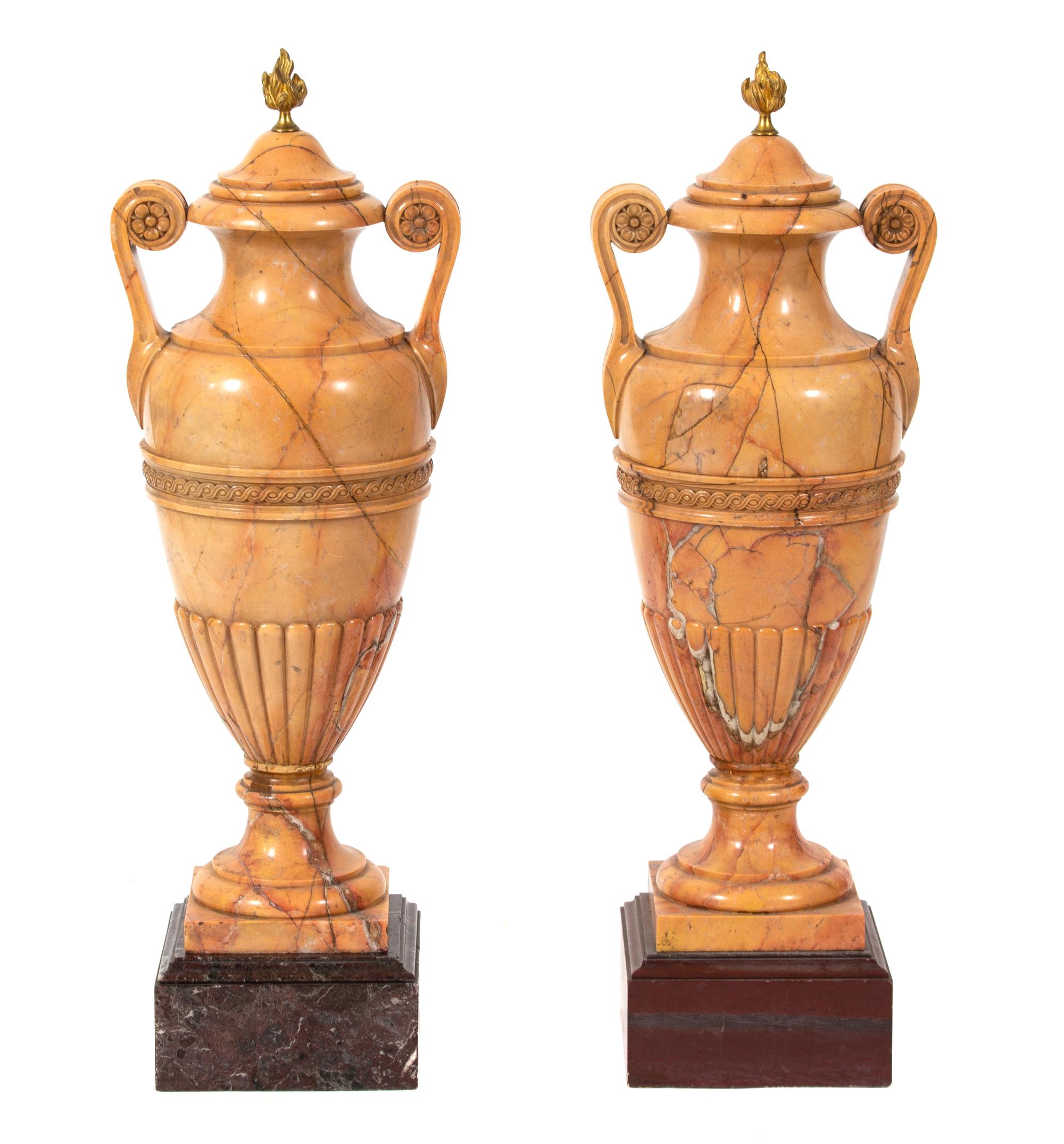 A Pair of Italian Crema Valencia Marble Double-Handled Urns Height 30 x diameter 10 1/2 inches. — 19TH CENTURY