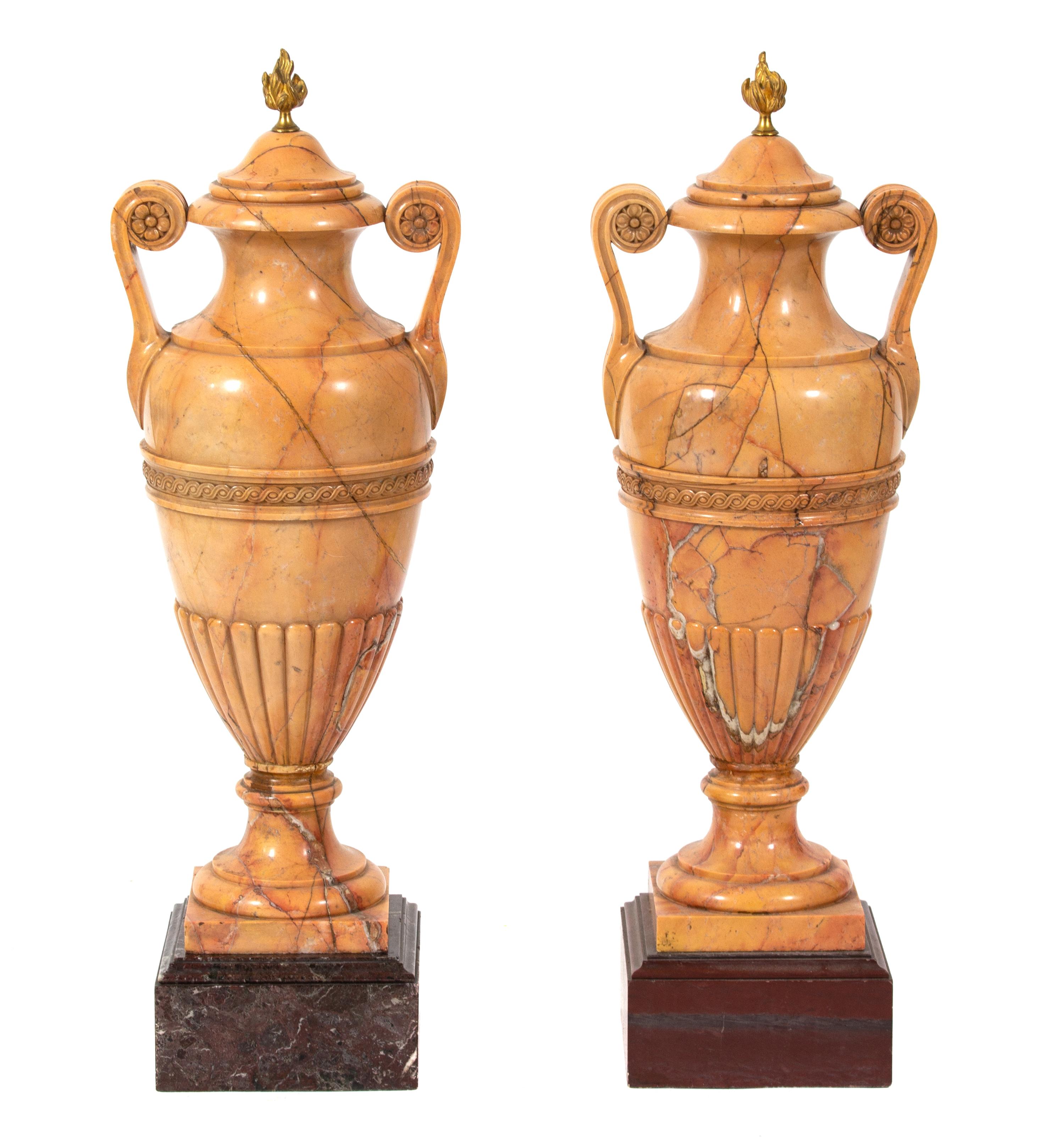A Pair of Italian Crema Valencia Marble Double-Handled Urns Height 30 x diameter 10 1/2 inches. — 19TH CENTURY