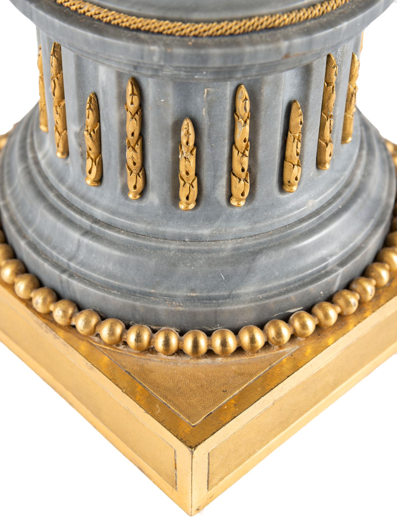 A Pair of French Gilt Bronze and Marble Candelabra