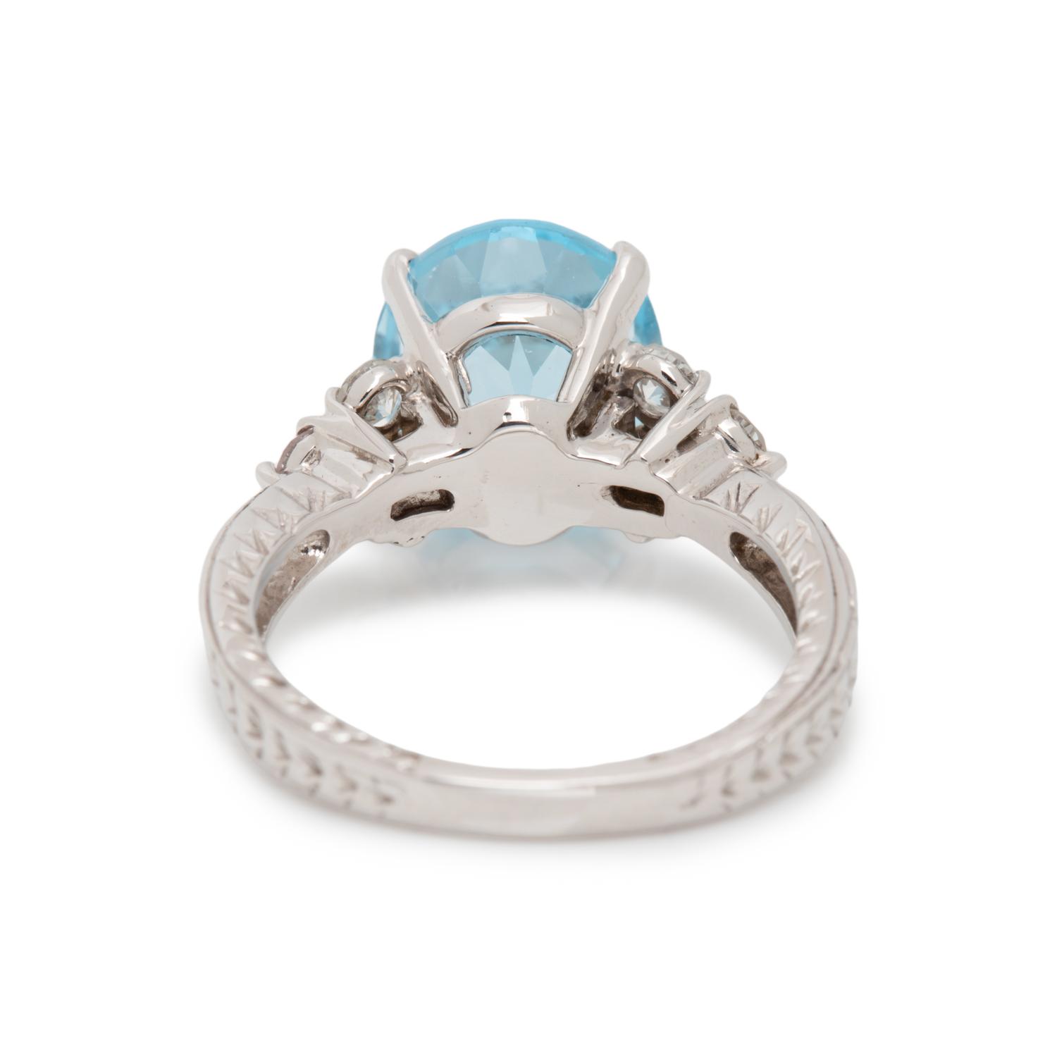 BLUE TOPAZ AND DIAMOND RING