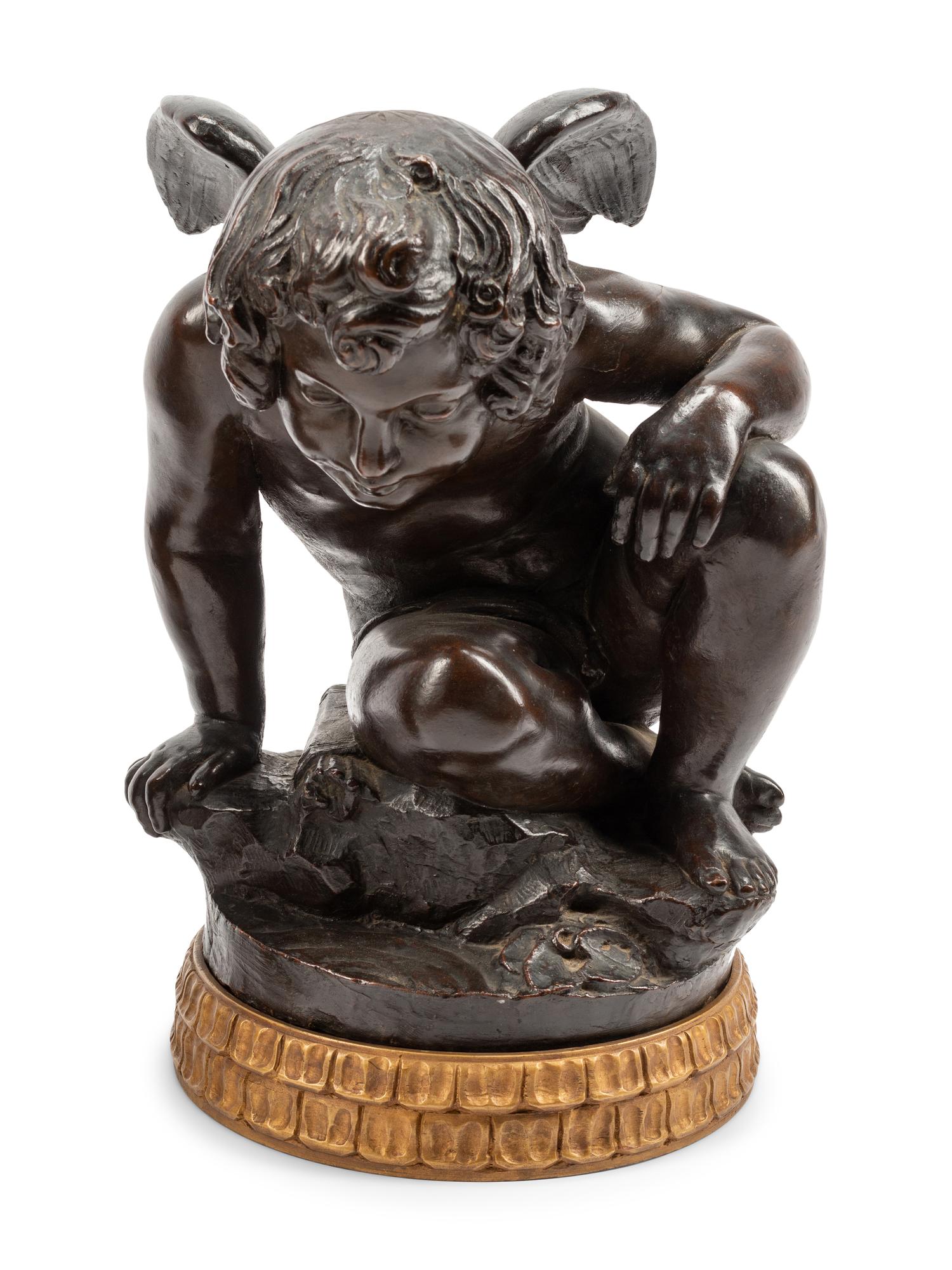 A Pair of Bronzed Terra Cotta Figures on Giltwood Bases