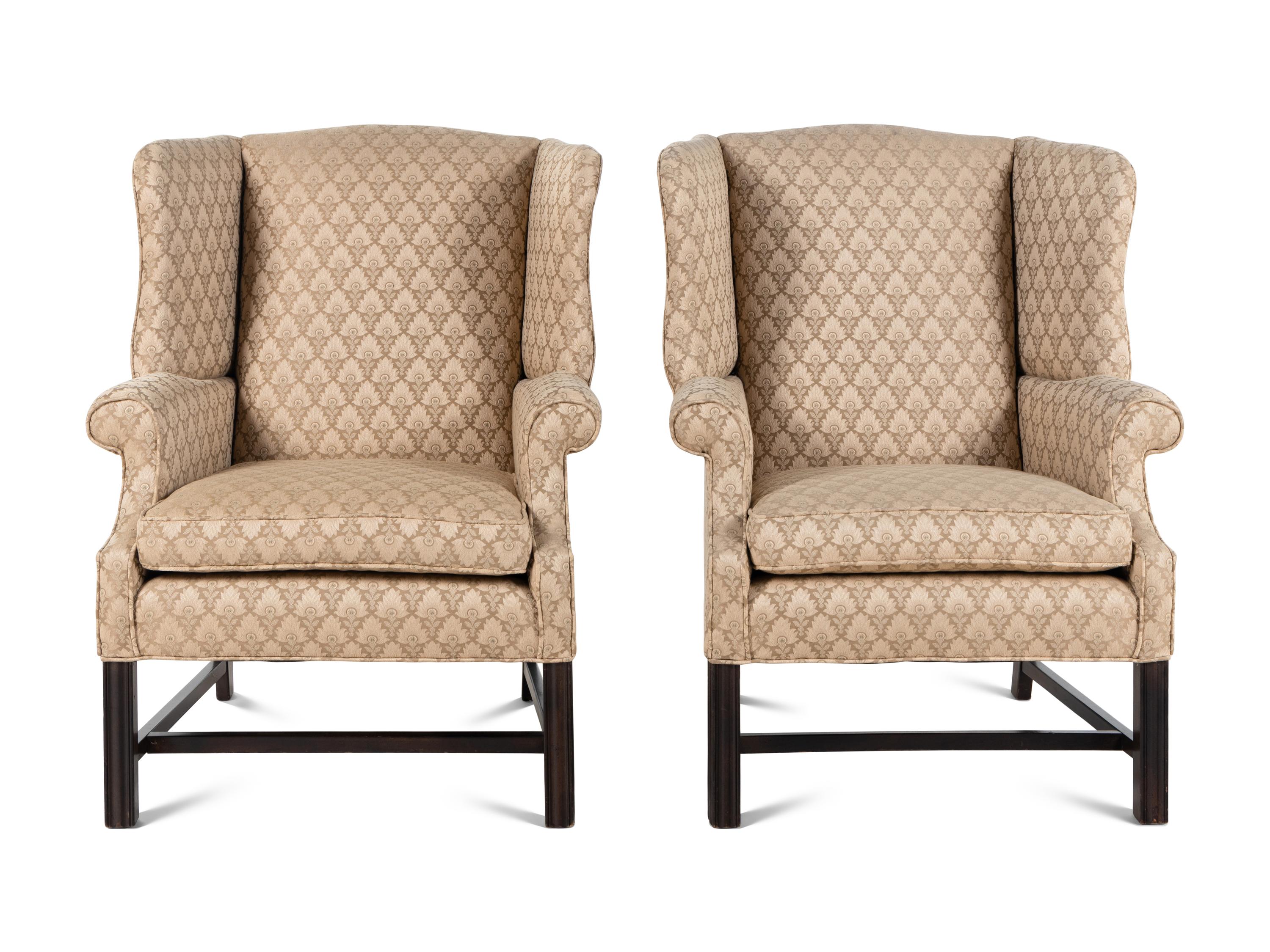 A Pair of George III Style Wingback Armchairs