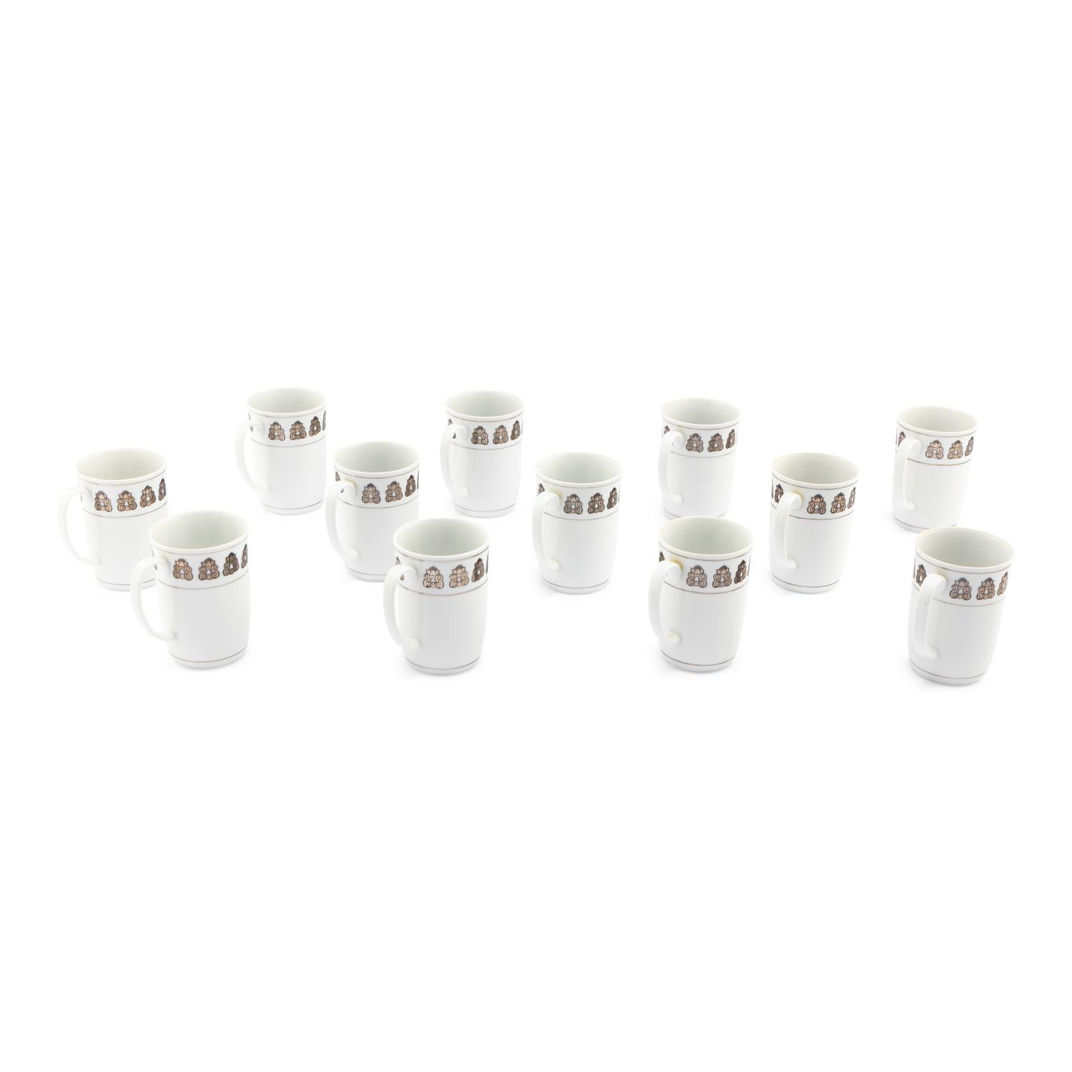 A Set of Twelve Georg Jensen Acorn Porcelain Coffee Mugs
