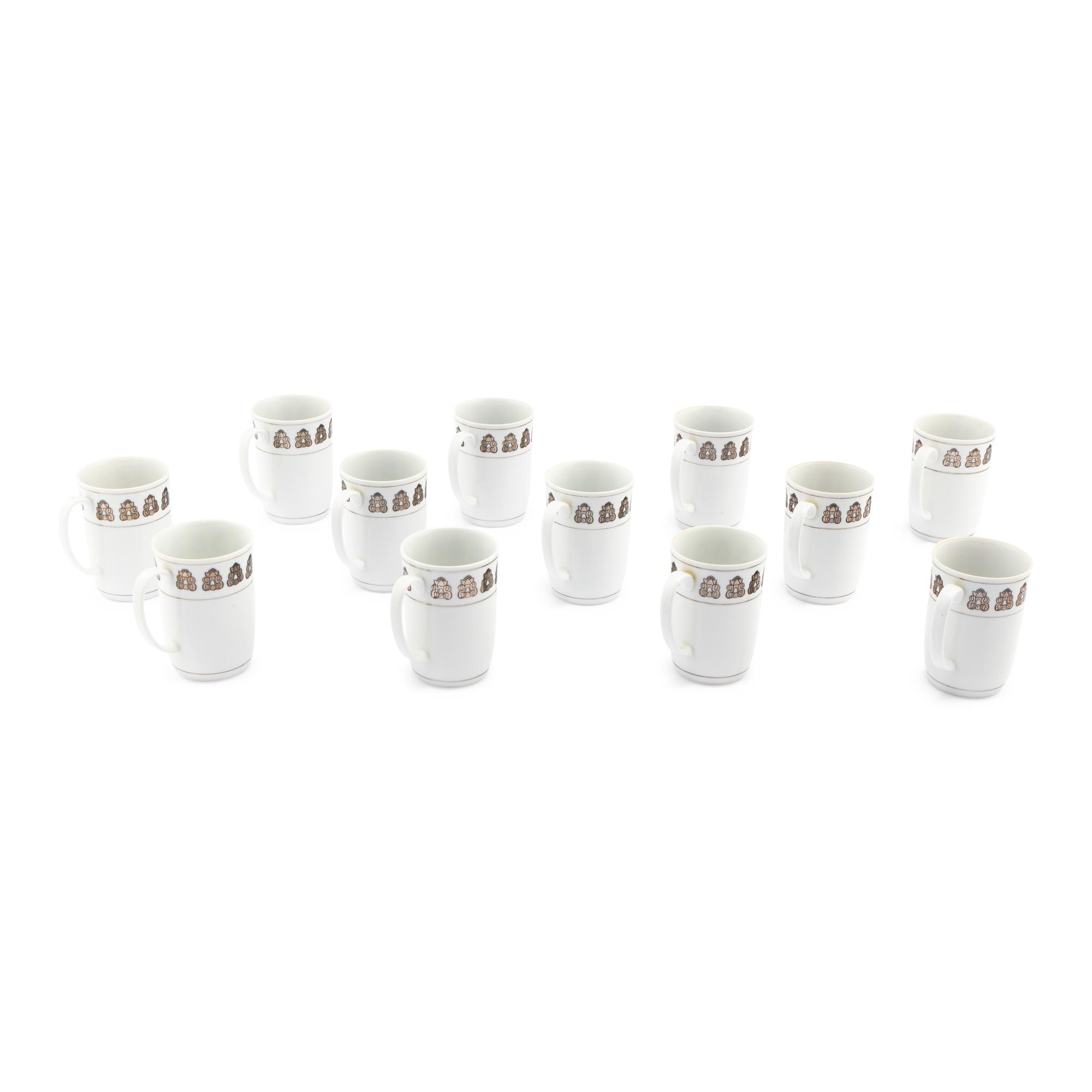A Set of Twelve Georg Jensen Acorn Porcelain Coffee Mugs