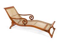 A British Colonial Caned Teak Chaise Longue — 19TH CENTURY