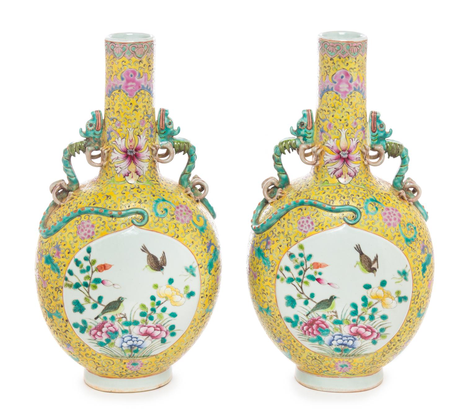 A Pair of Chinese Famille Jaune Porcelain Vases Height 14 1/4 inches.