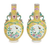 A Pair of Chinese Famille Jaune Porcelain Vases Height 14 1/4 inches.