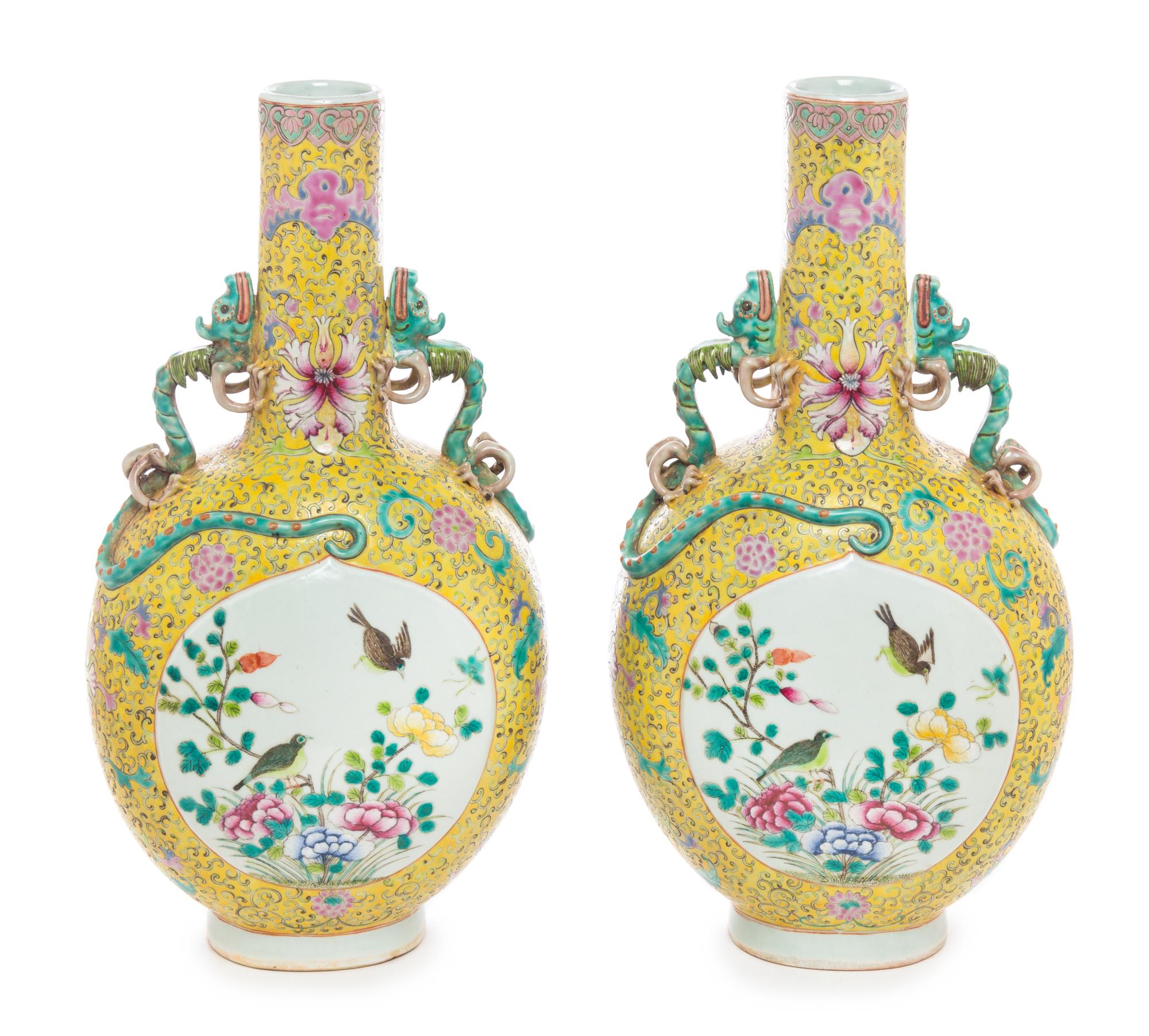 A Pair of Chinese Famille Jaune Porcelain Vases Height 14 1/4 inches.