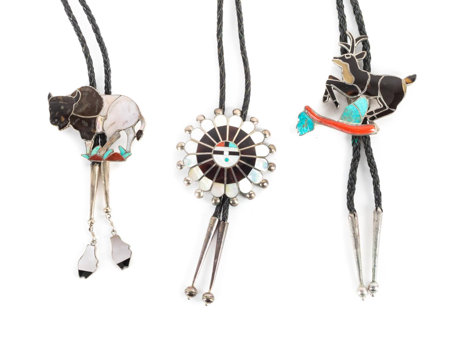 Three Zuni Silver and Multi-Stone Inlay Bolos Height of largest 3 1/4 x width 2 1/2 inches