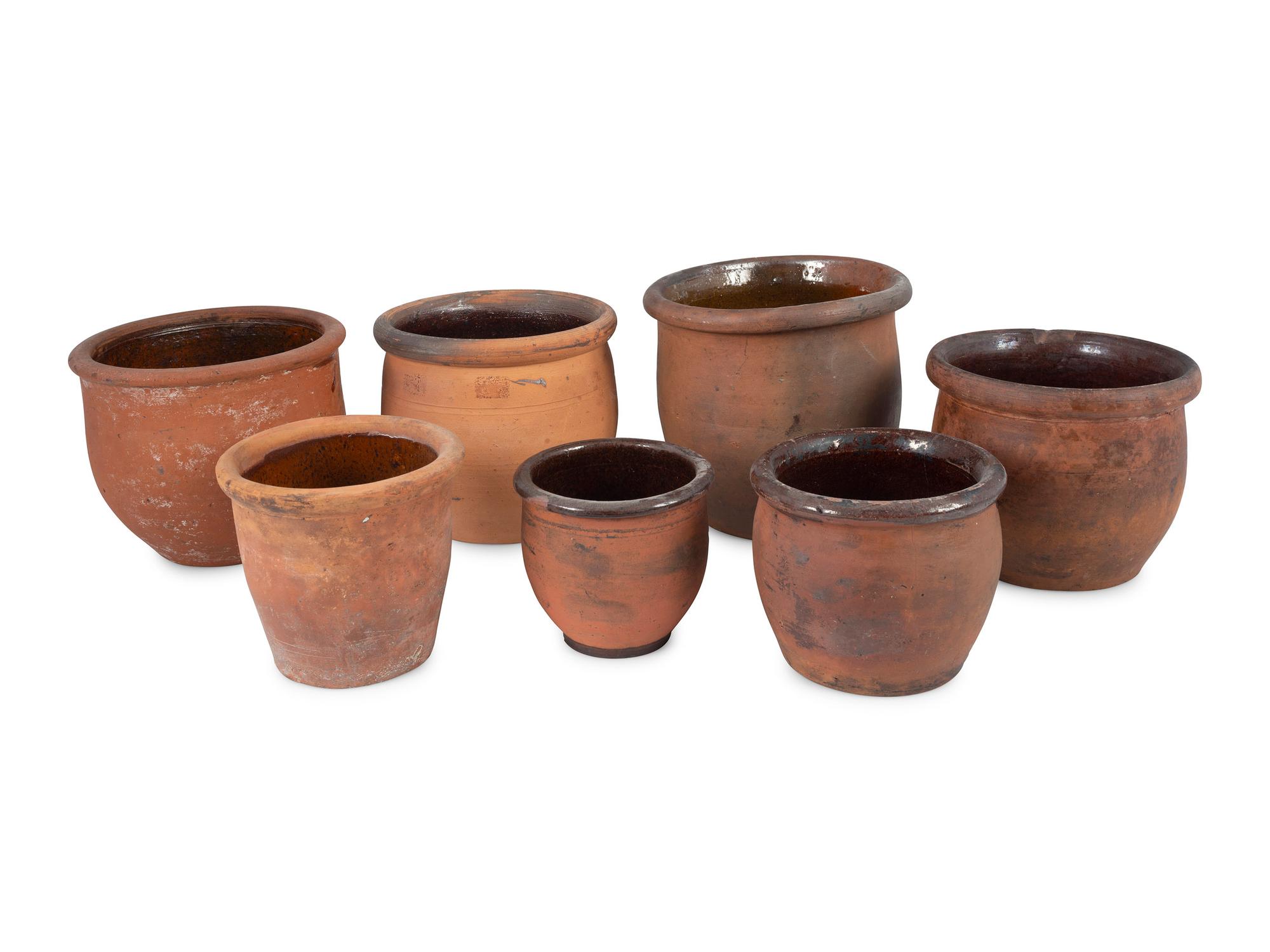 Seven Redware Jars with Glazed Interiors
