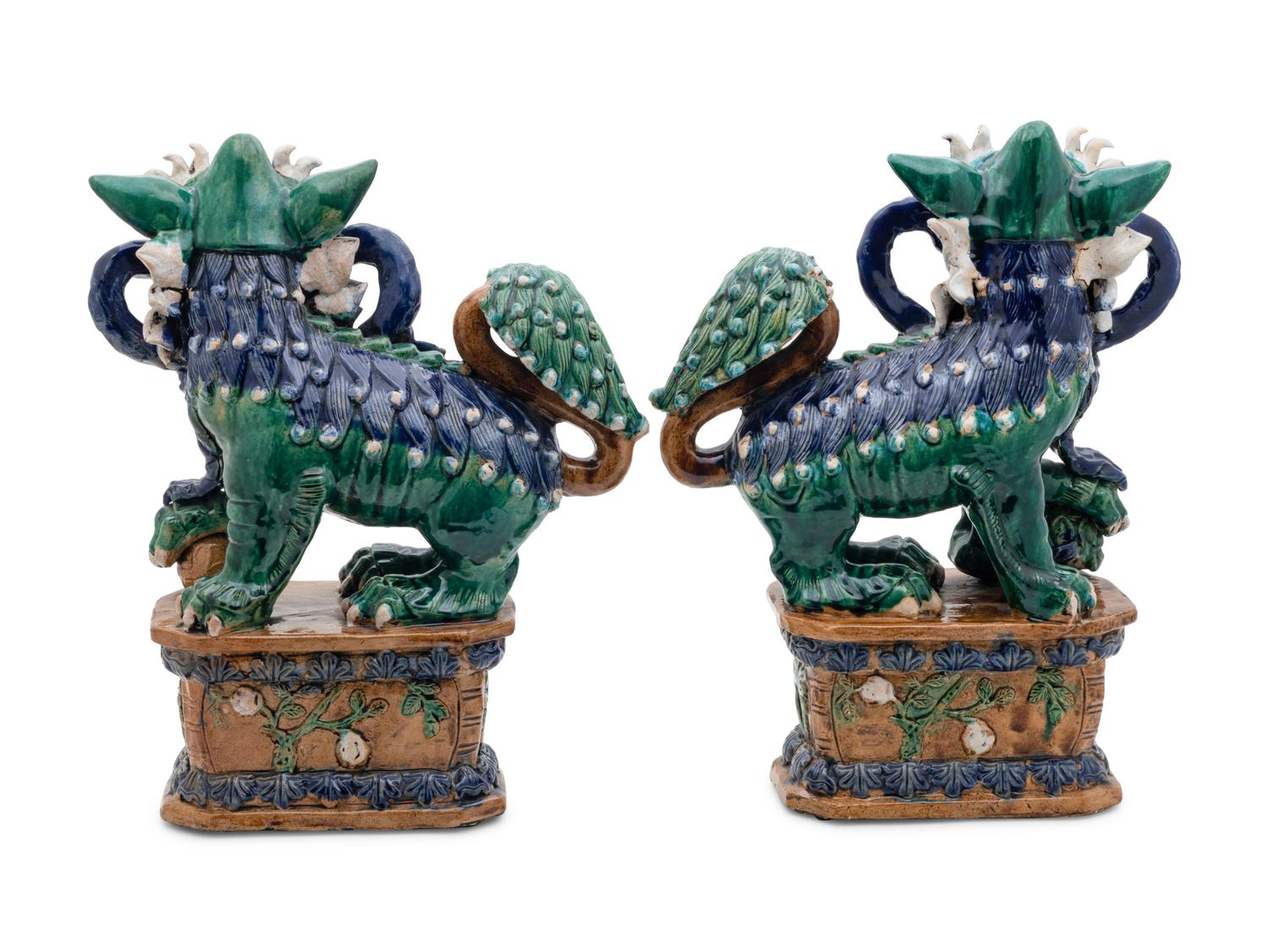 A Pair of Chinese Sancai -Glazed Porcelain Figures of Fu Lions