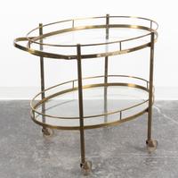 An Art Deco Style Brass Bar Cart Height 28 x width over handle 33 x depth 19 1/4 inches.