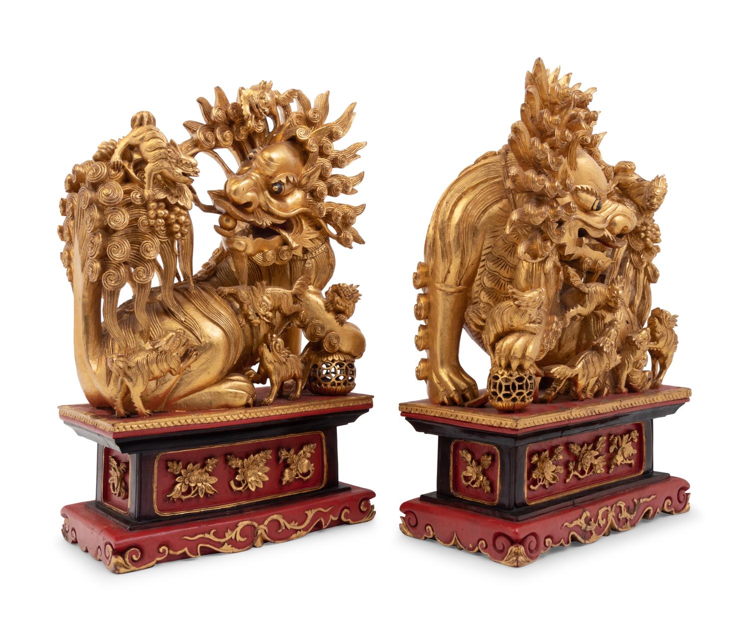 A Pair of Chinese Carved Giltwood Ornaments
