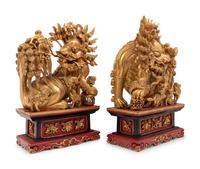 A Pair of Chinese Carved Giltwood Ornaments