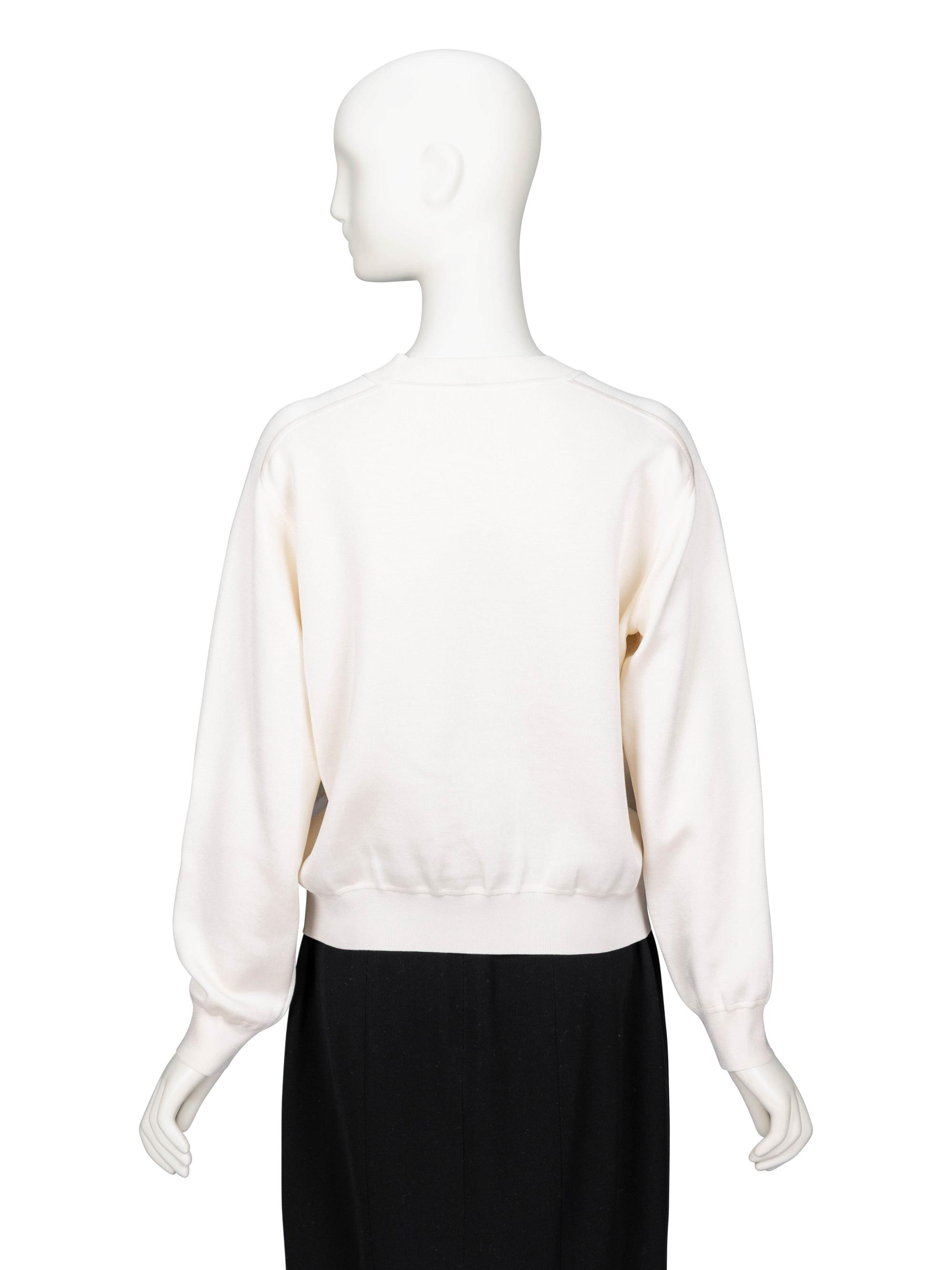 Hermès, Three White Sweaters