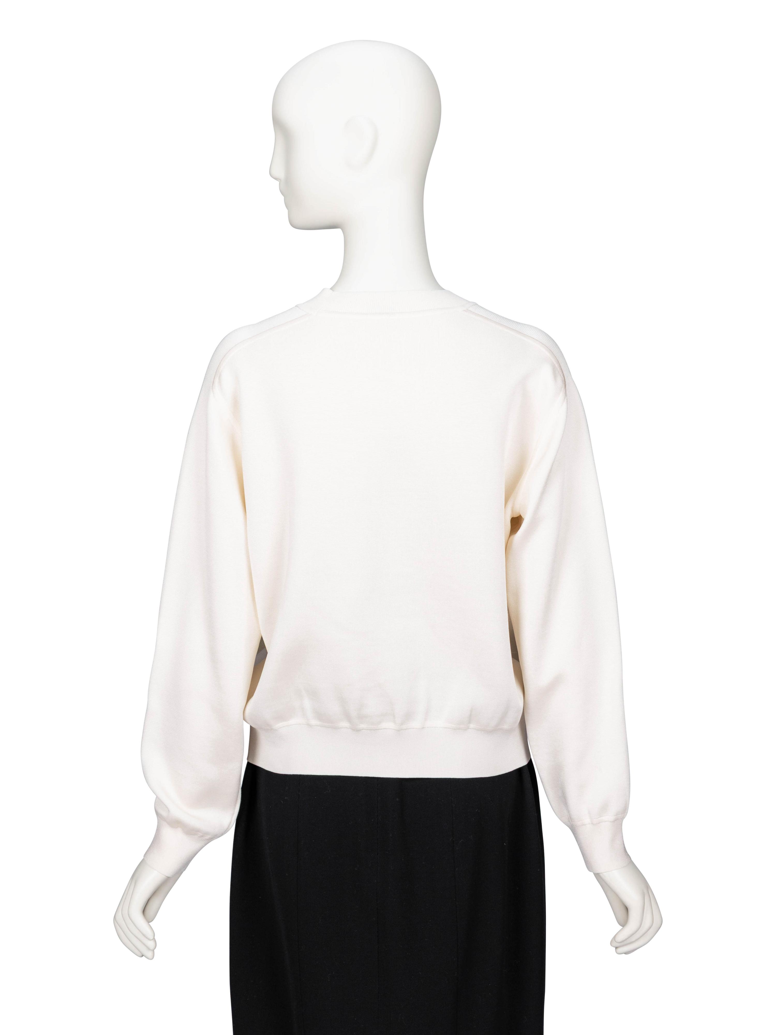 Hermès, Three White Sweaters