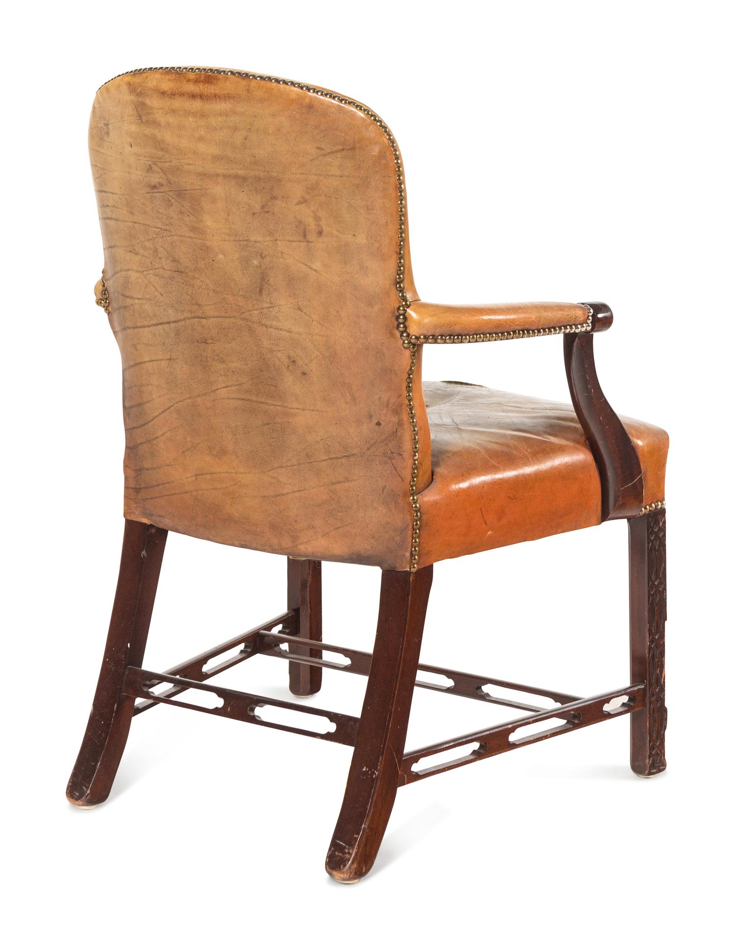 A Pair of George III Style Leather-Upholstered Mahogany Armchairs