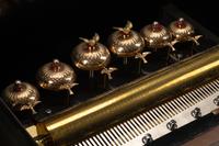 A Swiss “Bells in Sight” Cylinder Music Box on Stand