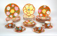 An Italian Glazed Ceramic Luncheon Service Diameter of largest 9 3/4 inches. — 20TH CENTURY