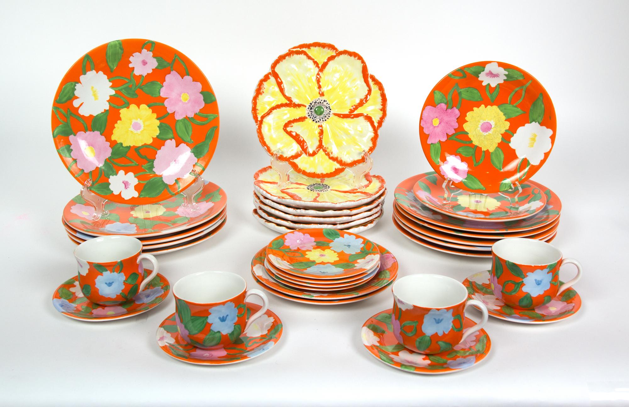 An Italian Glazed Ceramic Luncheon Service Diameter of largest 9 3/4 inches. — 20TH CENTURY