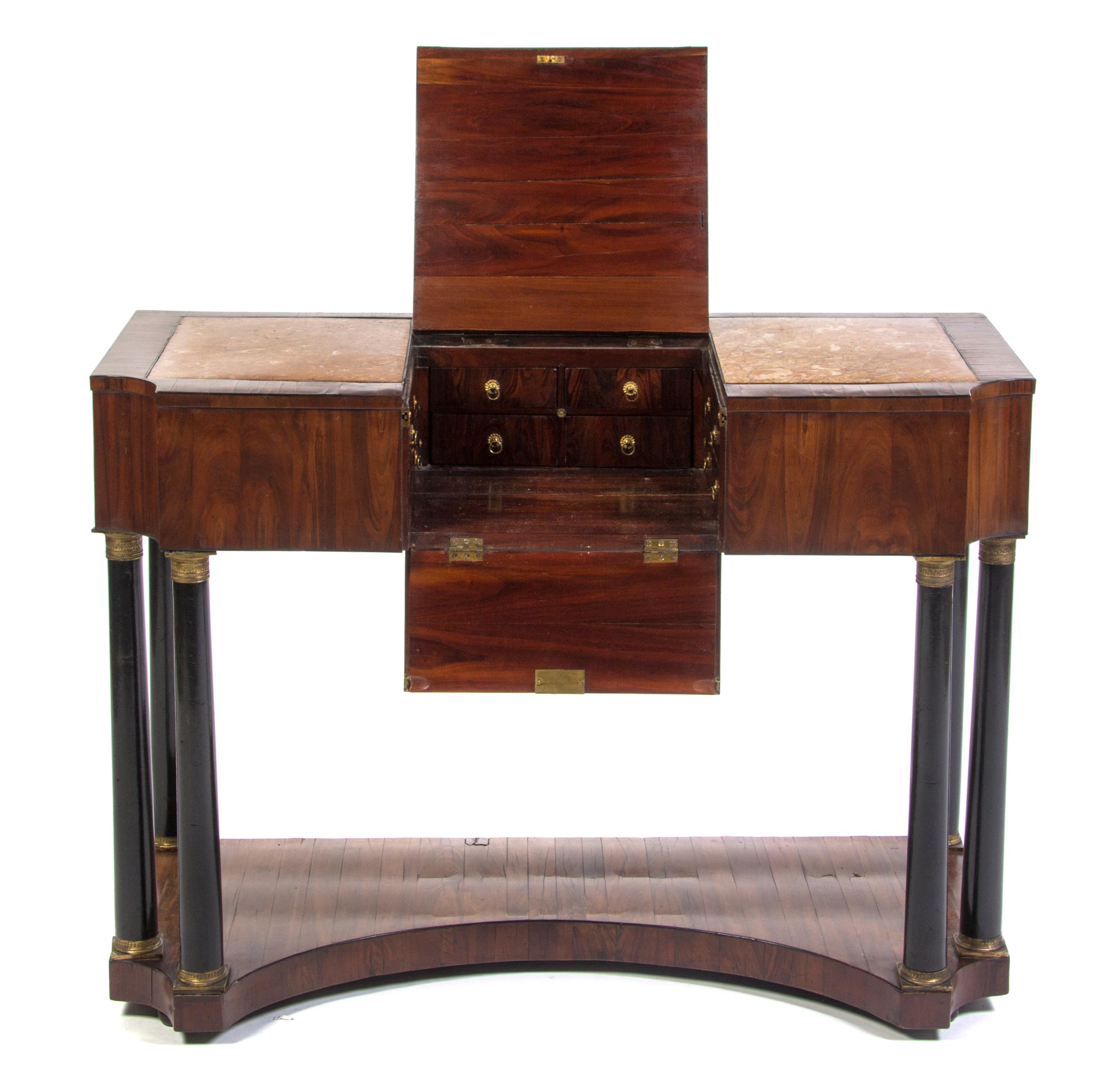 A Continental Walnut Veneered Dressing Table, Height 31 1/2 x width 43 1/4 x depth 20 inches.