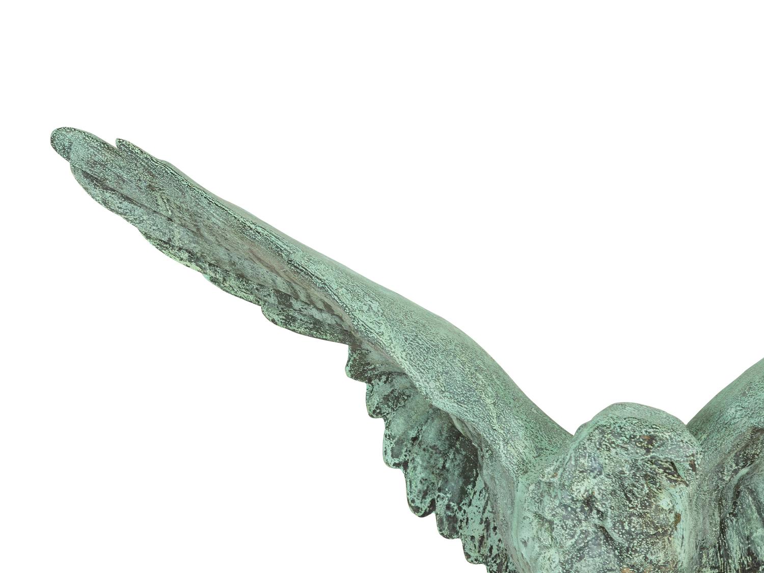 A Patinated Cast Metal Eagle Architectural Ornament with Verdigris Patina