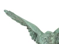 A Patinated Cast Metal Eagle Architectural Ornament with Verdigris Patina