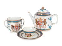 A Samson et Cie Parcel Gilt and Armorial Decorated Part Dinner Service
