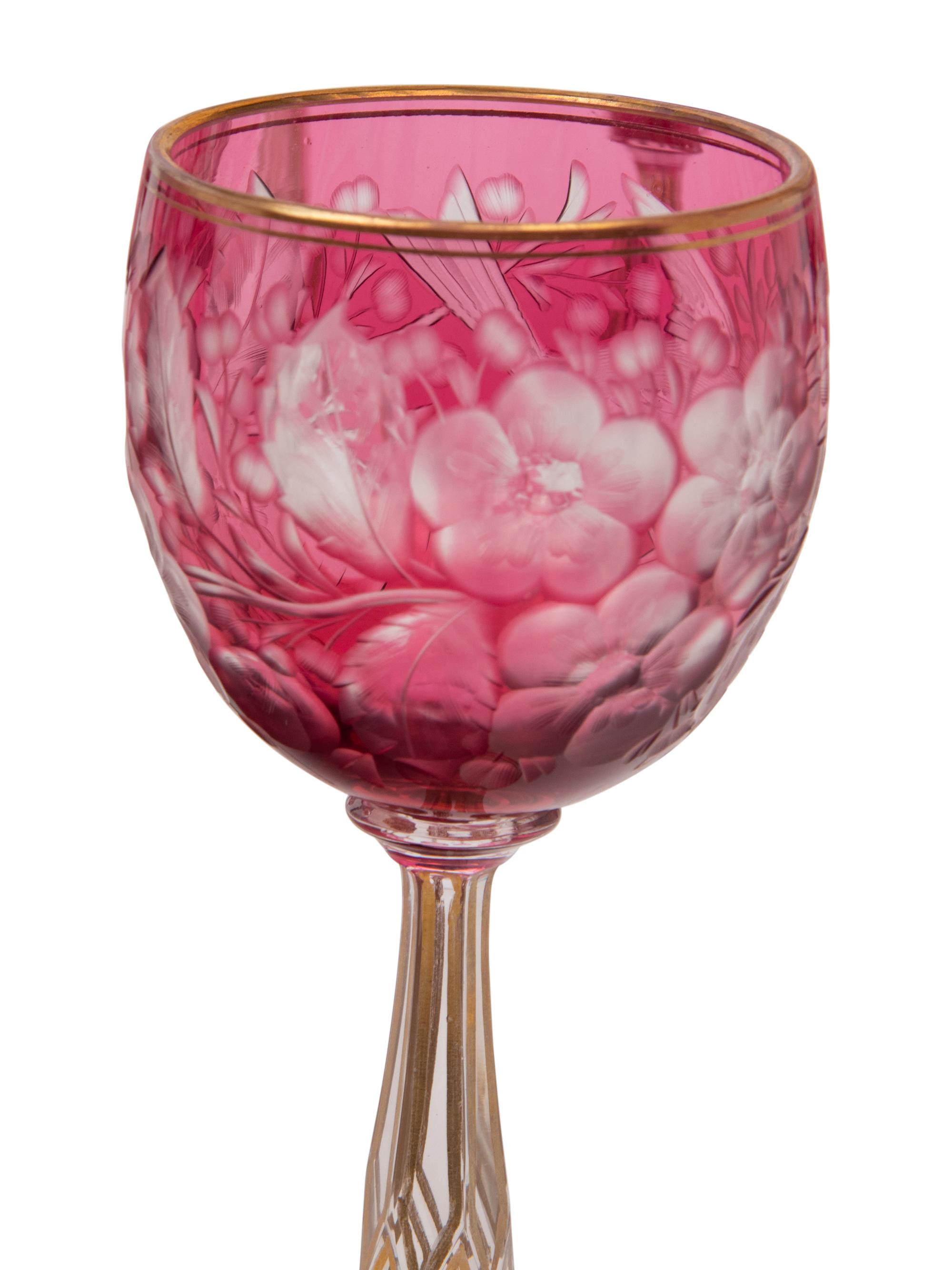 A Set of Twelve Bohemian Etched and Gilt Decorated Red Cut-to-Clear Wine Stems
