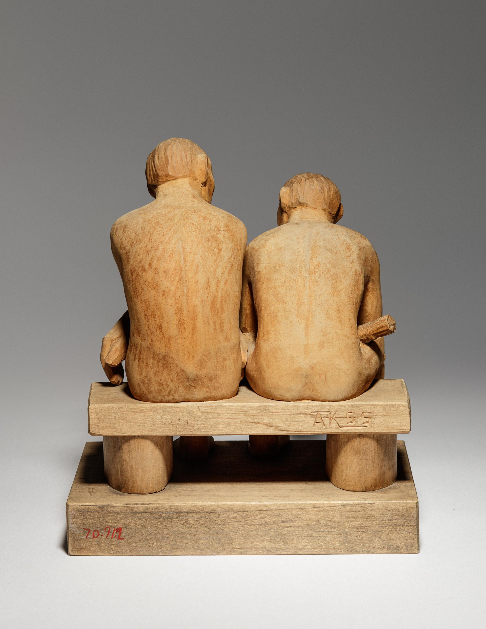 Two Seated Figures