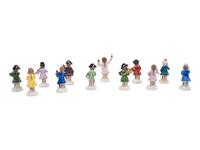 A German Porcelain Twelve-Piece Monkey Band