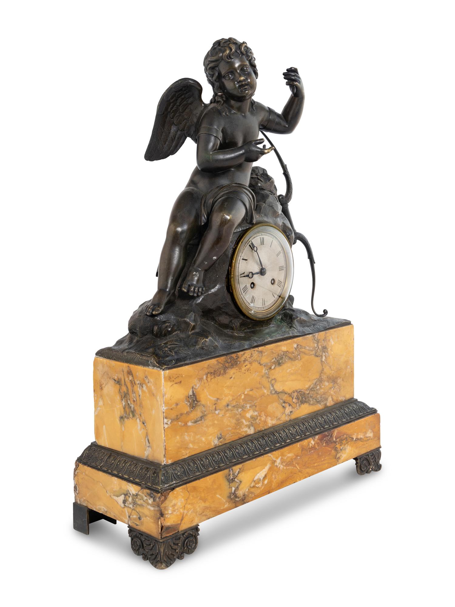 A Louis Philippe Bronze and Marble Figural Clock