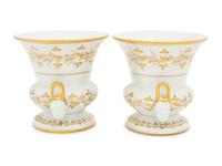 A Pair of French Parcel Gilt Porcelain Campagna Urns