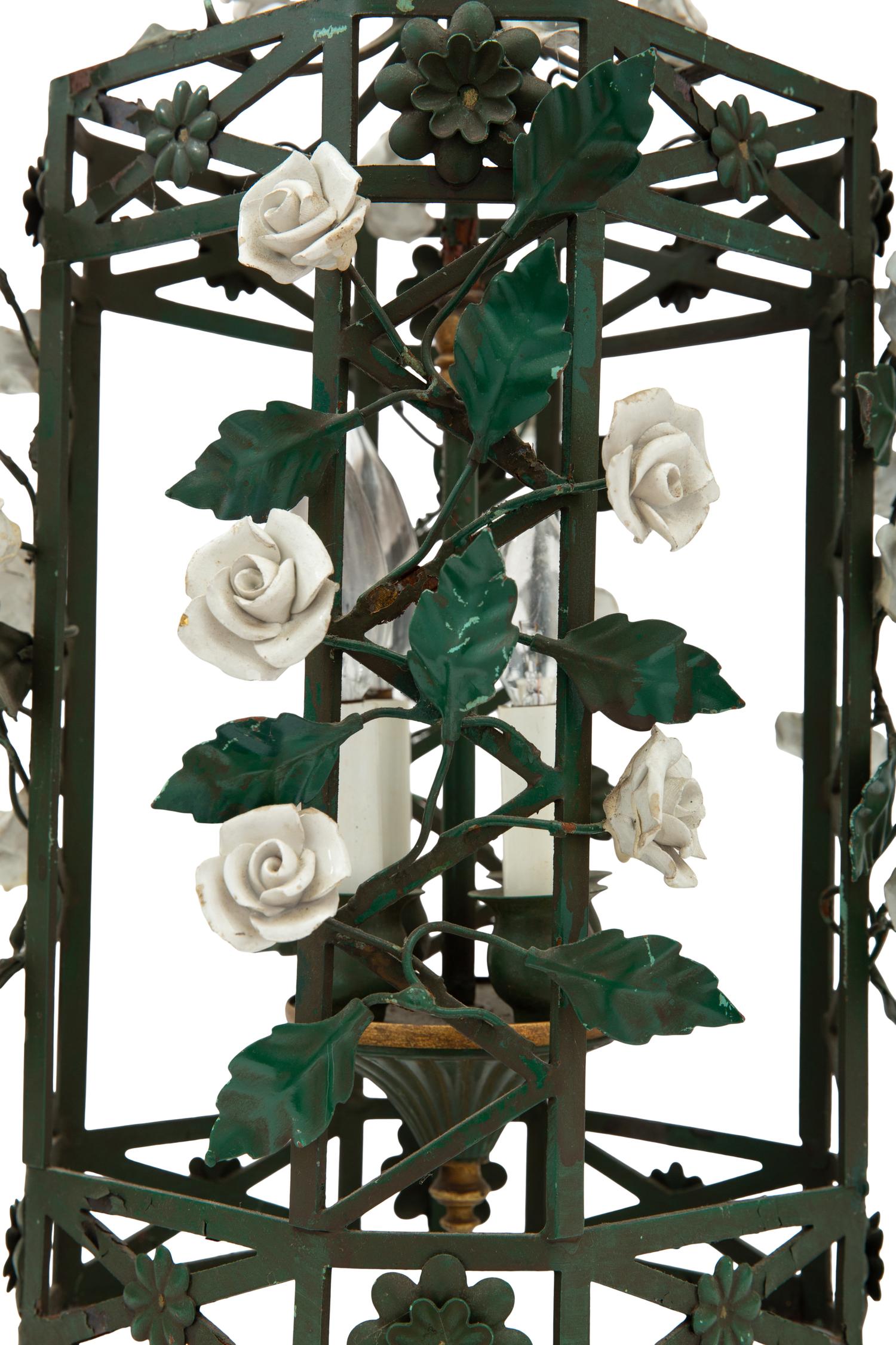 A Pair of Italian Tole and Porcelain Four-Light Lanterns