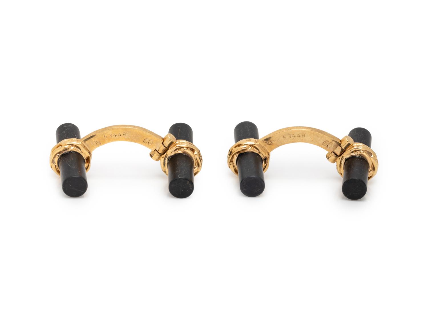 HERMÈS, YELLOW GOLD AND ONYX CUFFLINKS