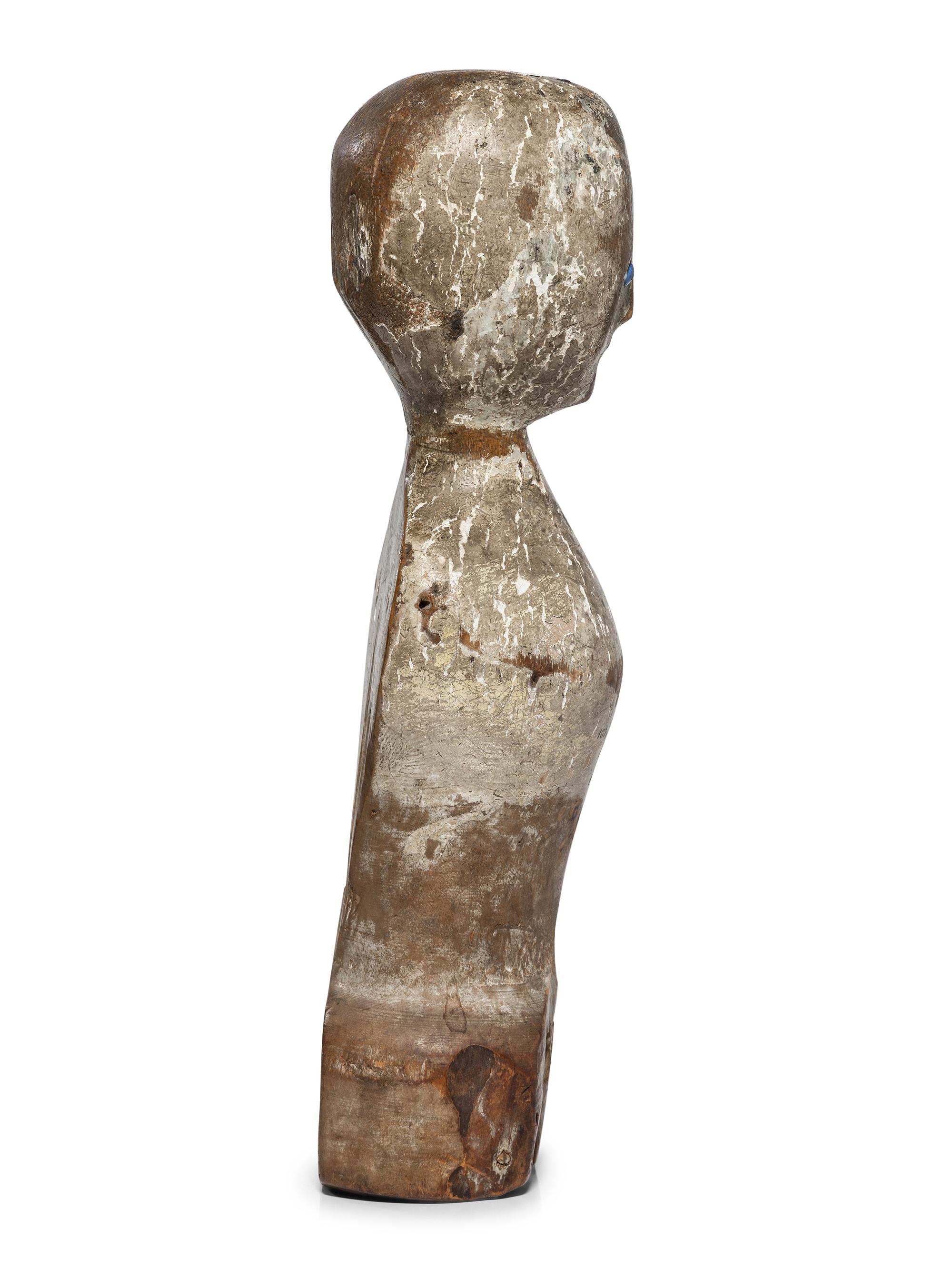 A Folk Art Carved, Painted and Glass Inset Wood Doll "Bed Post" Figure