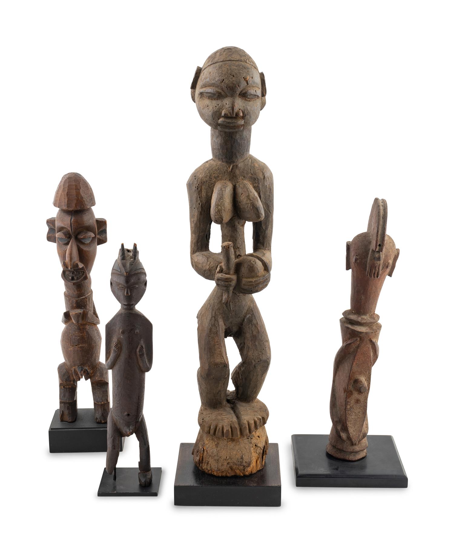Four African Carved Wood Figures — 20TH CENTURY
