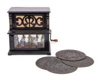 An Amorette Automaton Sixteen Key Organette with 8 3/4 Inch Disks