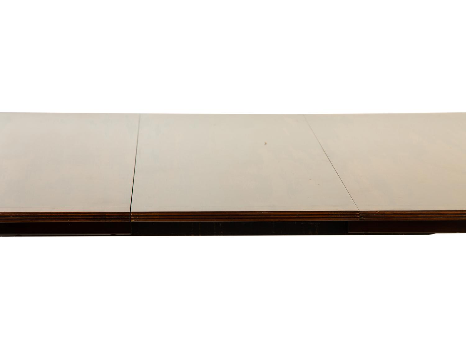 A Baker George III Style Mahogany Double-Pedestal Dining Table