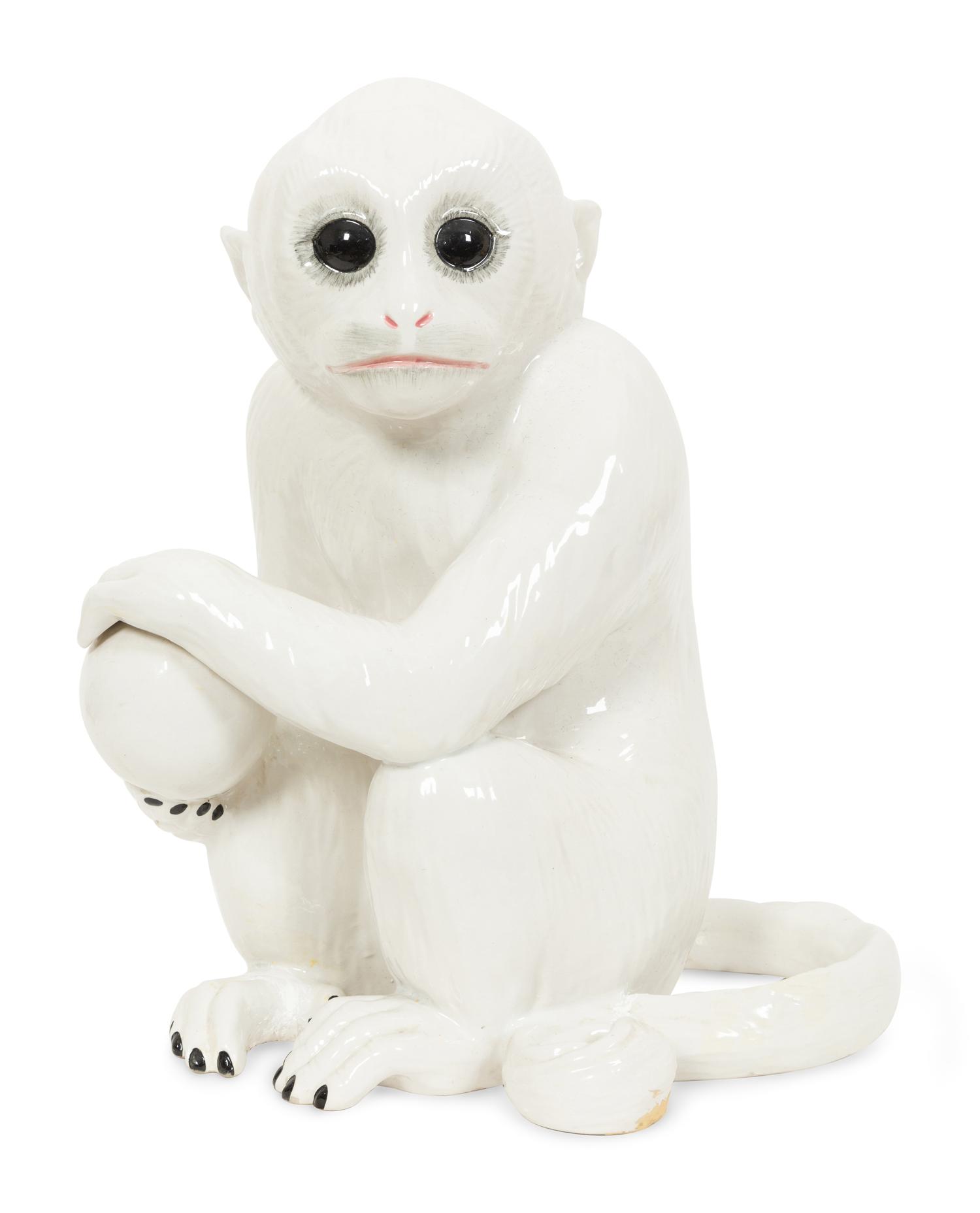 An Italian White Glazed Ceramic Monkey