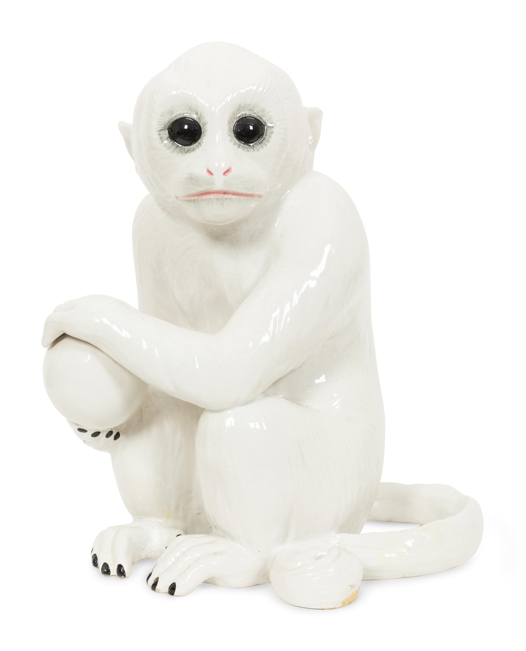 An Italian White Glazed Ceramic Monkey